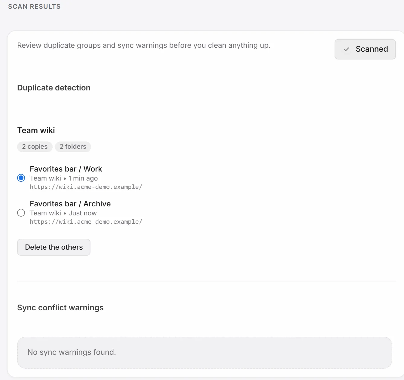 Duplicate detection showing two copies of Team wiki across Work and Archive.